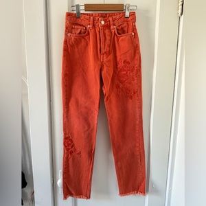 Jeans orange coupe vintage taille haute